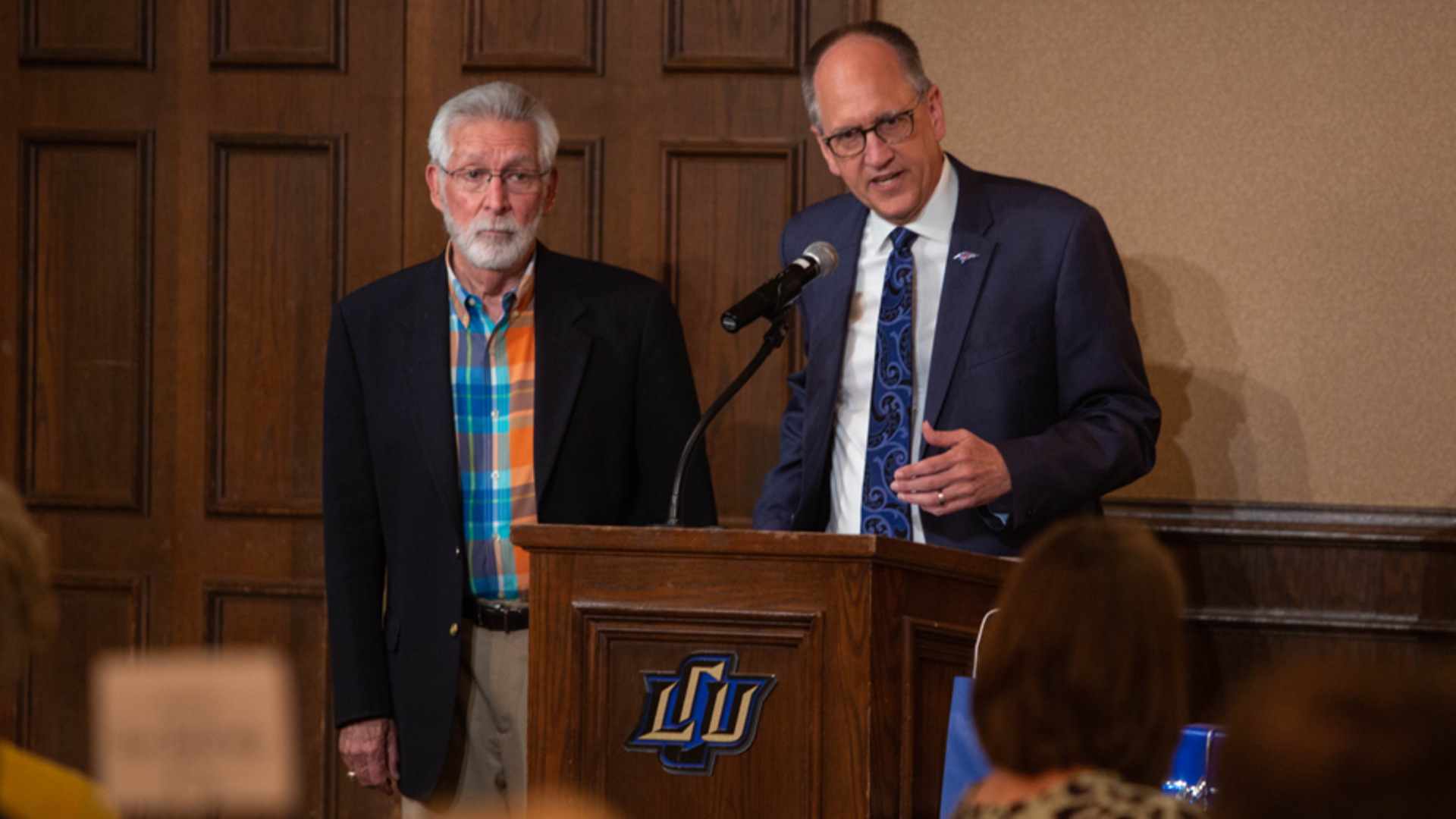 President Perrin and Dr. Don Williams at the LCU podium