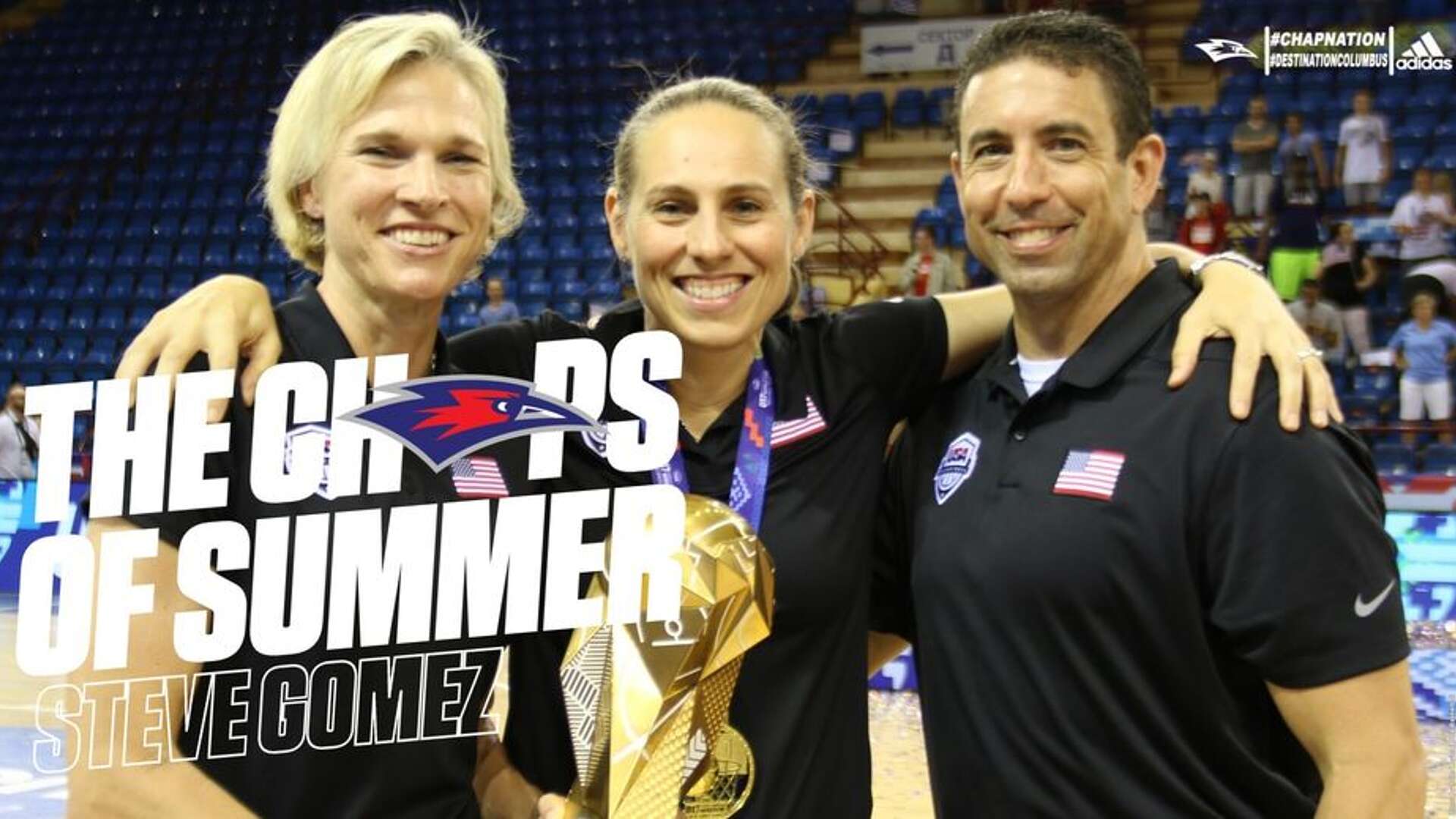 Gomez pictured with other USA coaches and the World Cup gold medal.