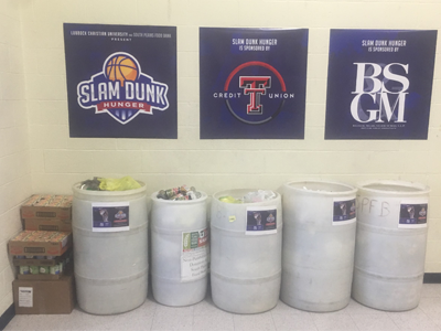 Barrels of can donations at the event