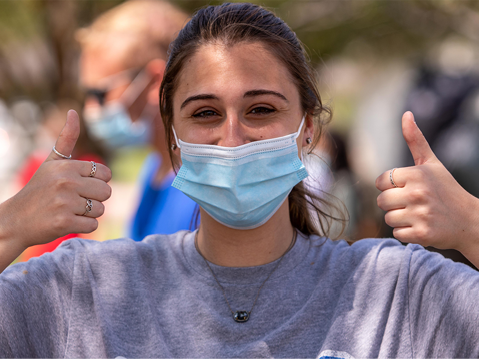 Student with thumbs up