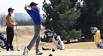 Member of LCU men's golf team teeing off