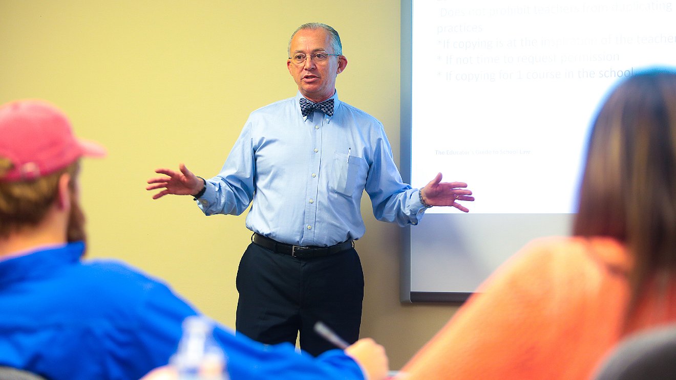 Dr. Sam Ayers telling a story to his students