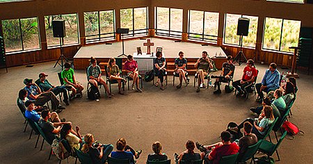 students talking in a large circle