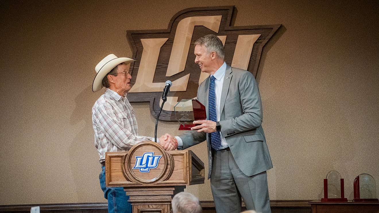 James Hobbs with award