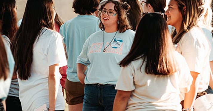 Zeta social club talking outside
