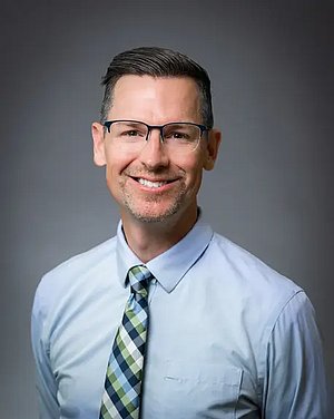 Headshot photograph of Josh Clem