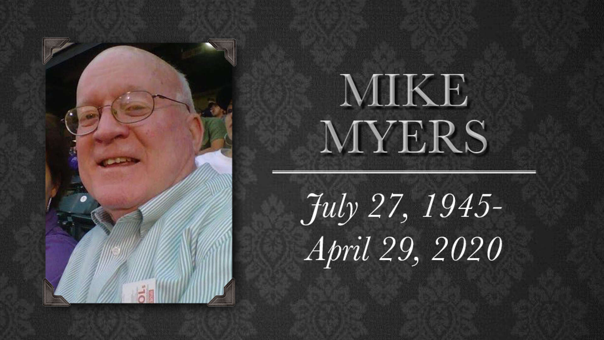 Mike Myers photo on gray damask background