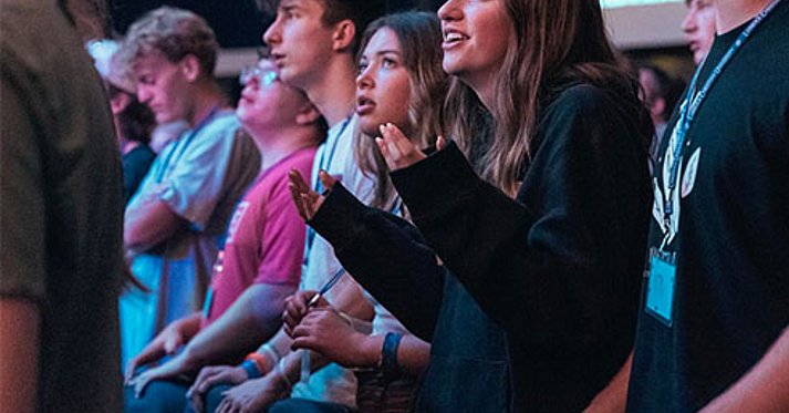 Girl singing at event 