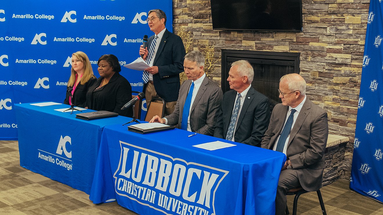 Leadership from LCU and AC signing agreement