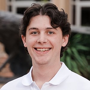 Headshot photograph of Chay