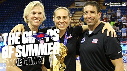 Gomez pictured with other USA coaches and the World Cup gold medal.