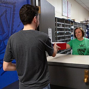 Student at post office