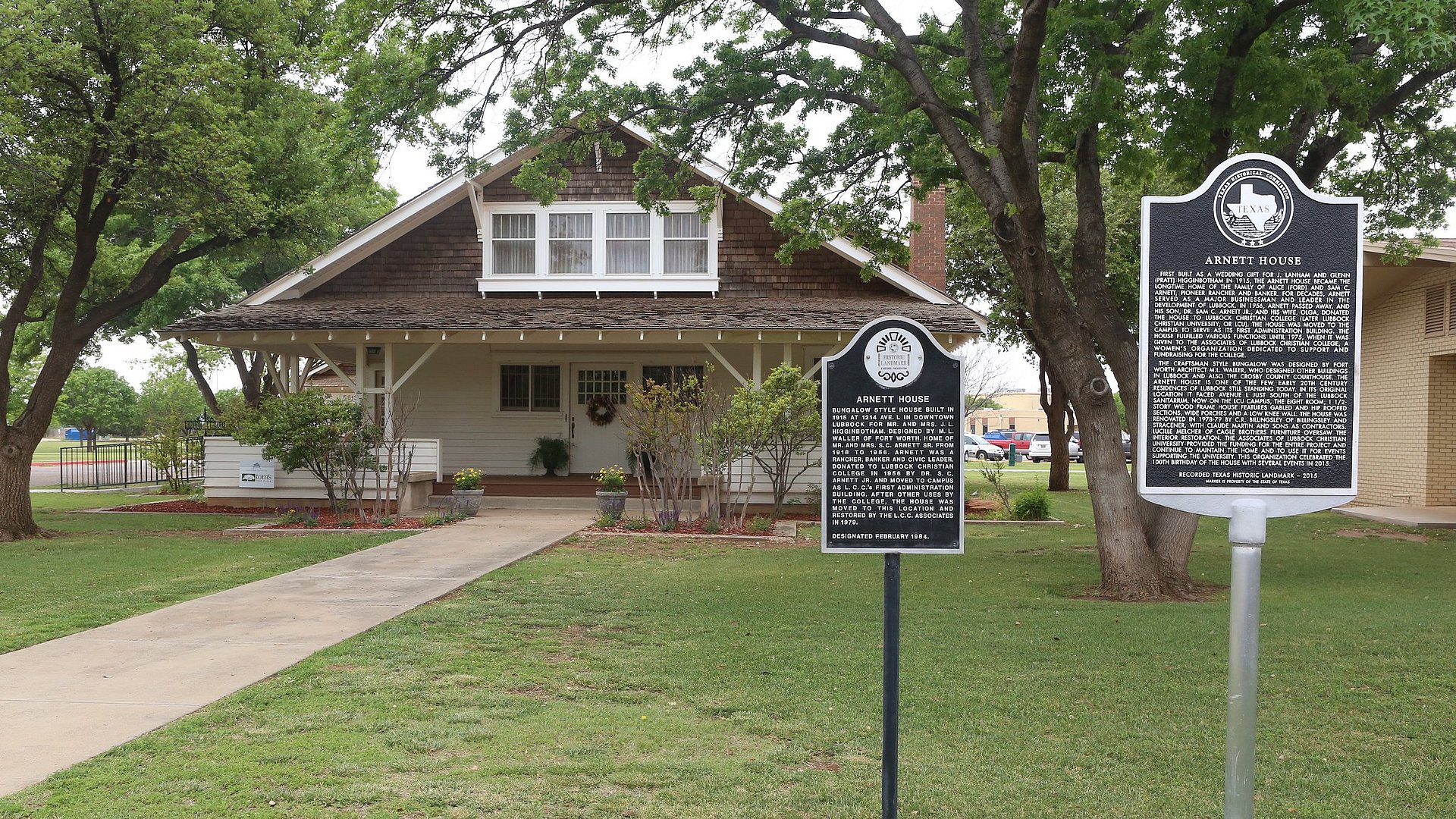 Infront of the Arnett house looking west with historical signs