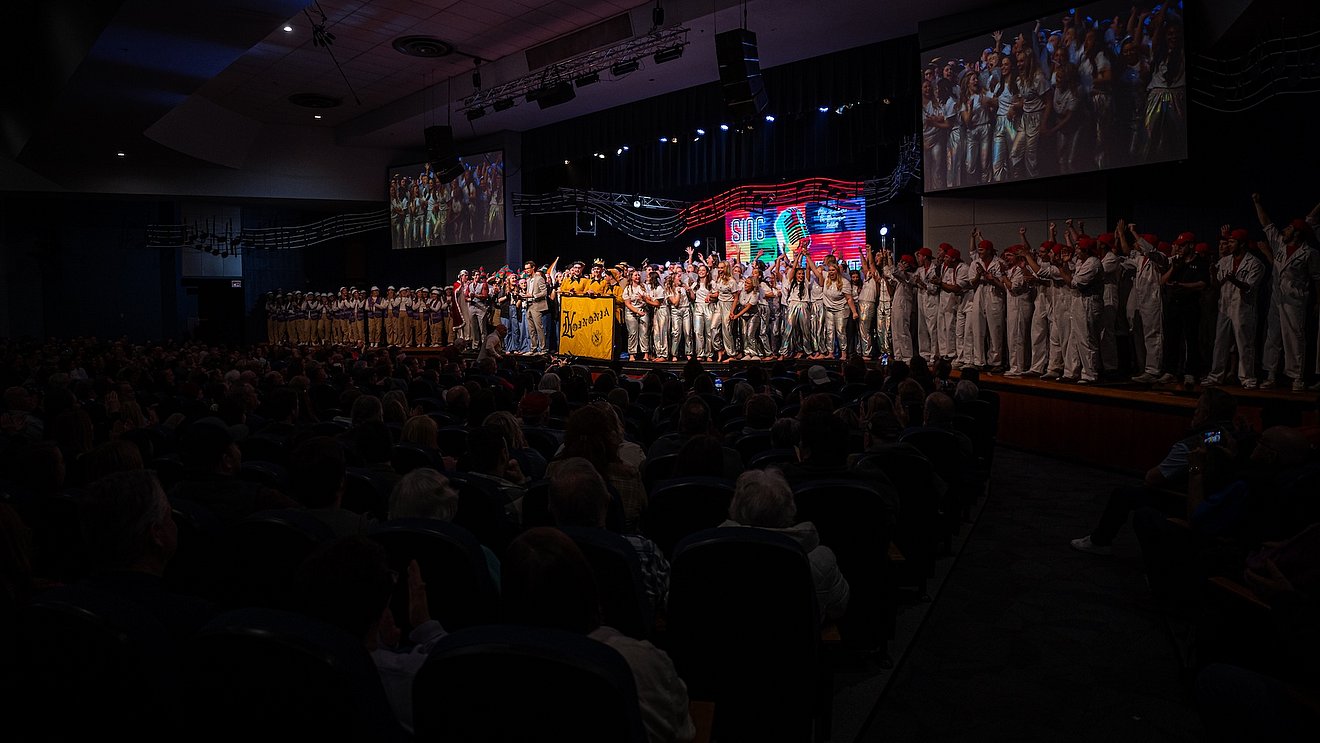 Photograph of clubs on stage at the end of Master Follies