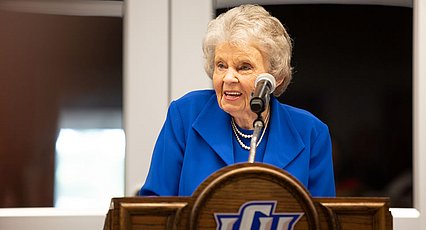 Dr. Crista Dobbs at podium