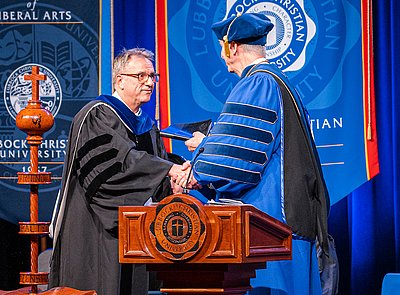 Dr. Dabbs is thanked by President McDowell