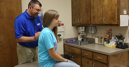 Dr. Smith working with student