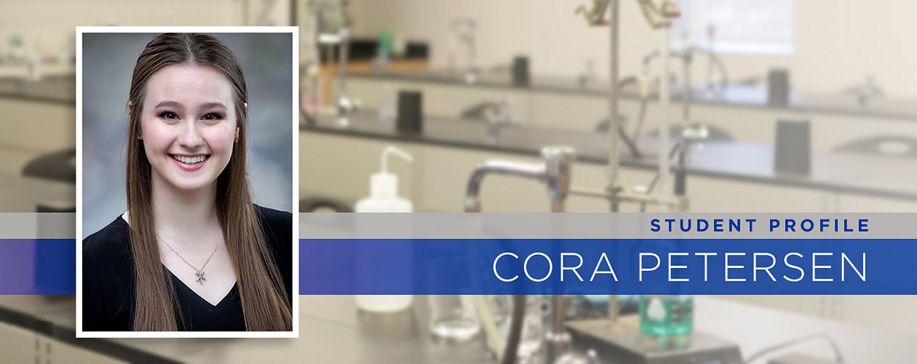 Cora Petterson headshot placed in front of classroom lab tables.