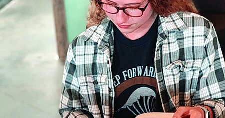 Girl reading a bible