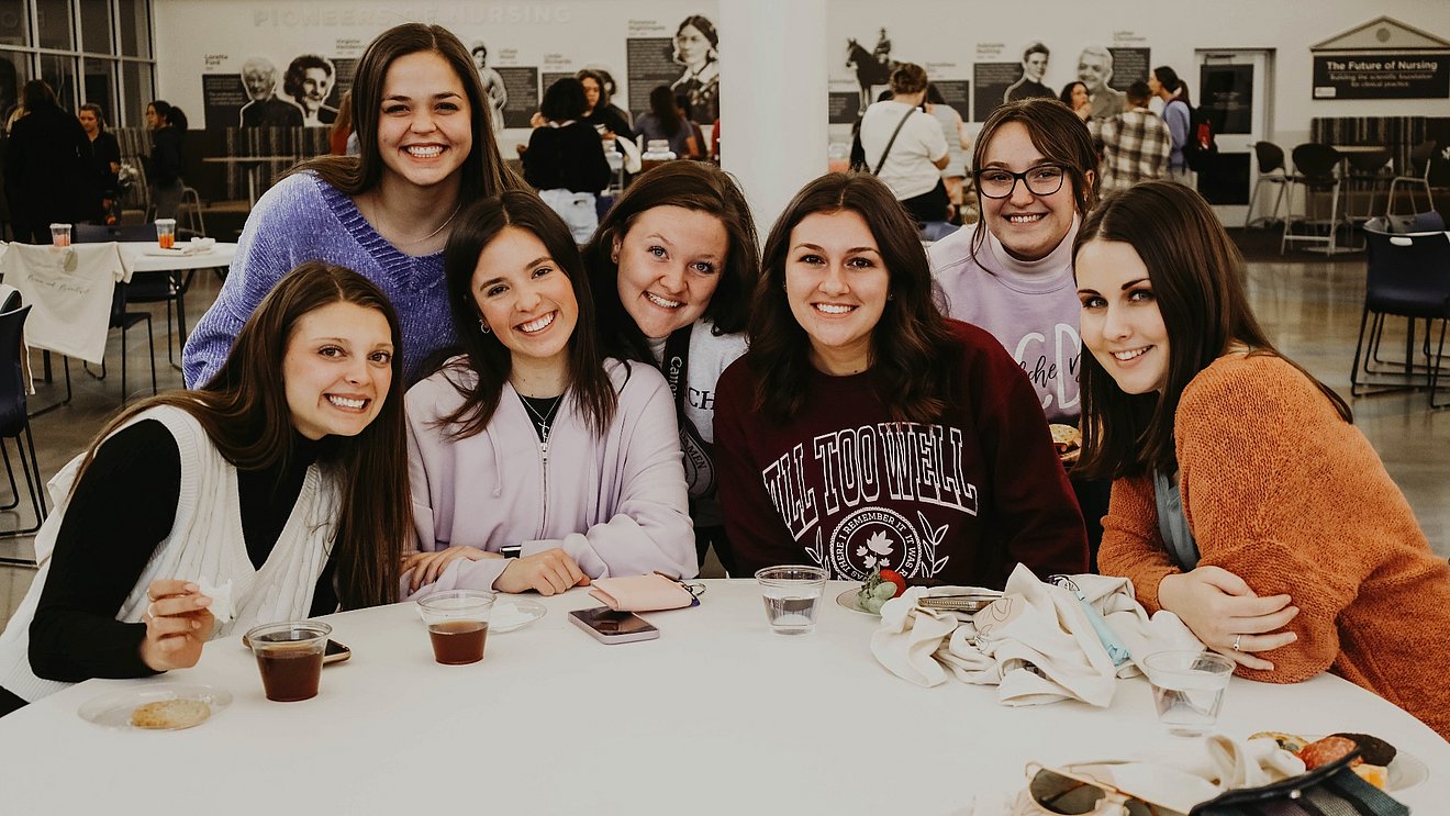 Female LCU students posing at "Brave and Beautiful" event