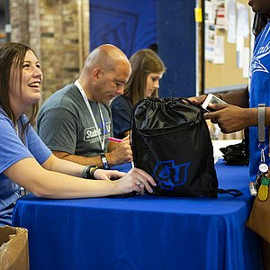 Parent at orientation table