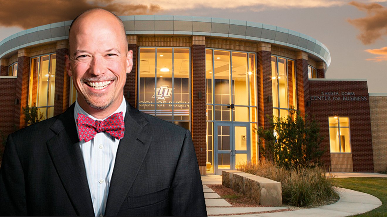 Matt Bumstead in front of Christa Dobbs Center for Business