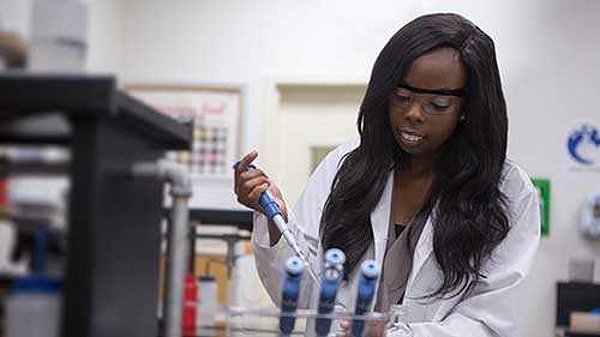 student in chemistry lab