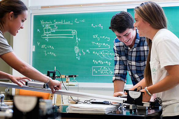 group of students working on a physics project