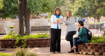 Dr. Jana Anderson instructing students in the LCU mall area