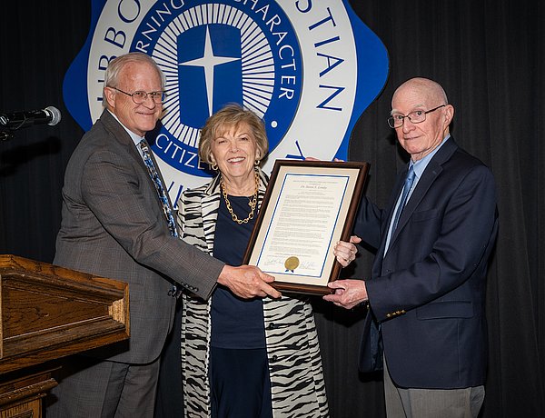 Dr. Lemley awarded by Dr. Stacy Patty