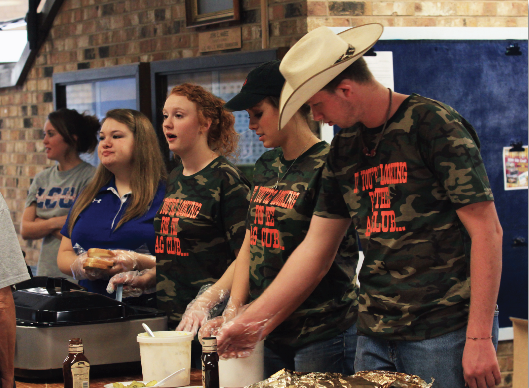 Ag students serving barbecue
