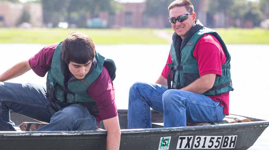 Dr. Bart Durham and student in boat
