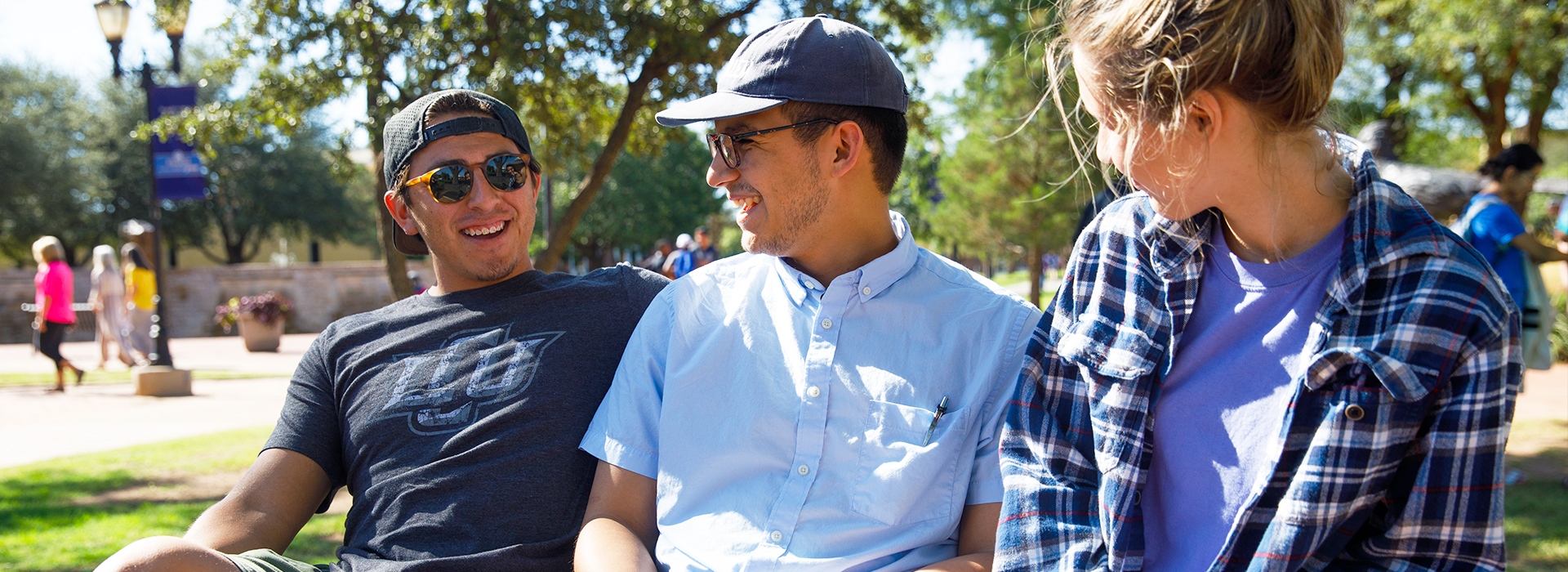 Students talking on bench