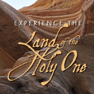 Desert valley with the words Experience the Land of the Holy One overlayed