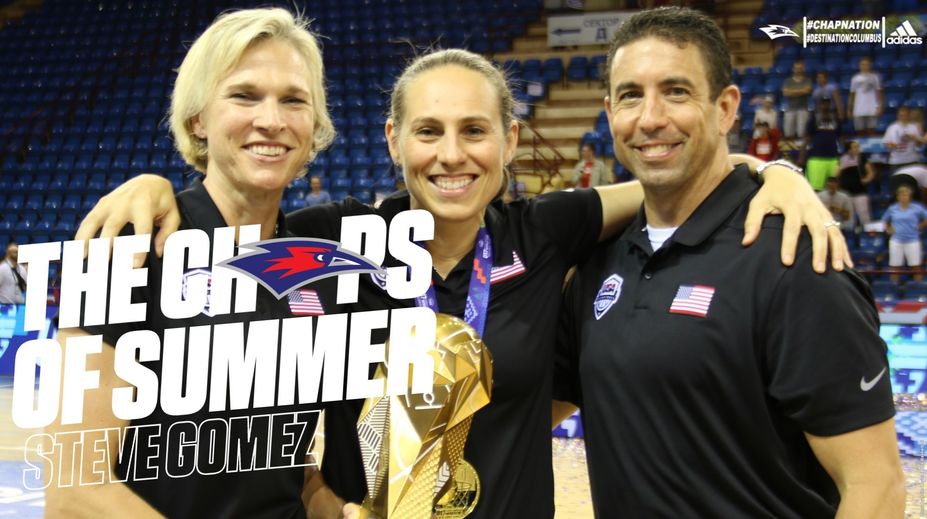 Gomez pictured with other USA coaches and the World Cup gold medal.