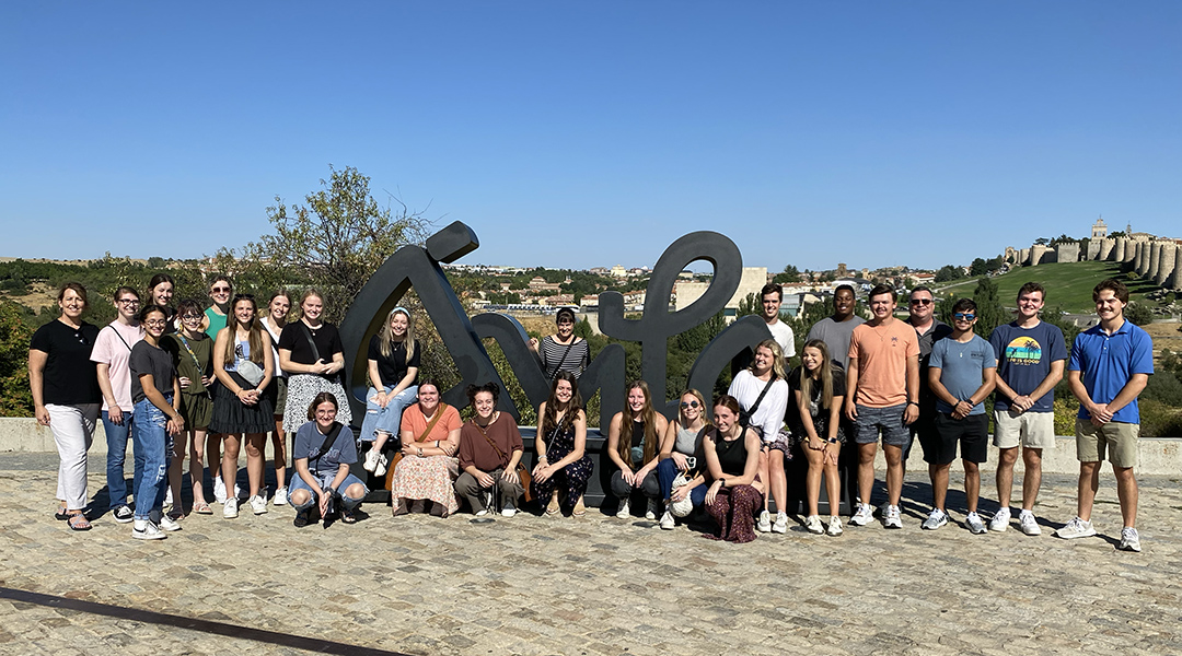 Group photo of LCU's students in front of the Ávila sign in Spain