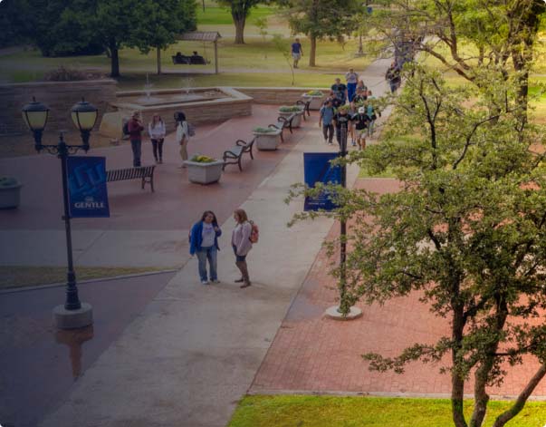 Students near outdoor fountain from up above